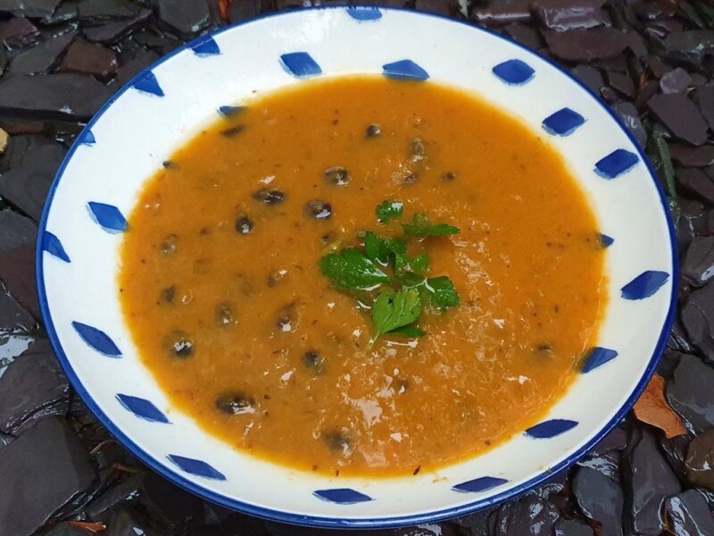 Roasted squash and sweet potato soup with black beans