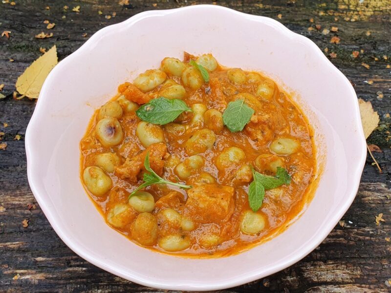 Tempeh and broad beans in baked tomato sauce