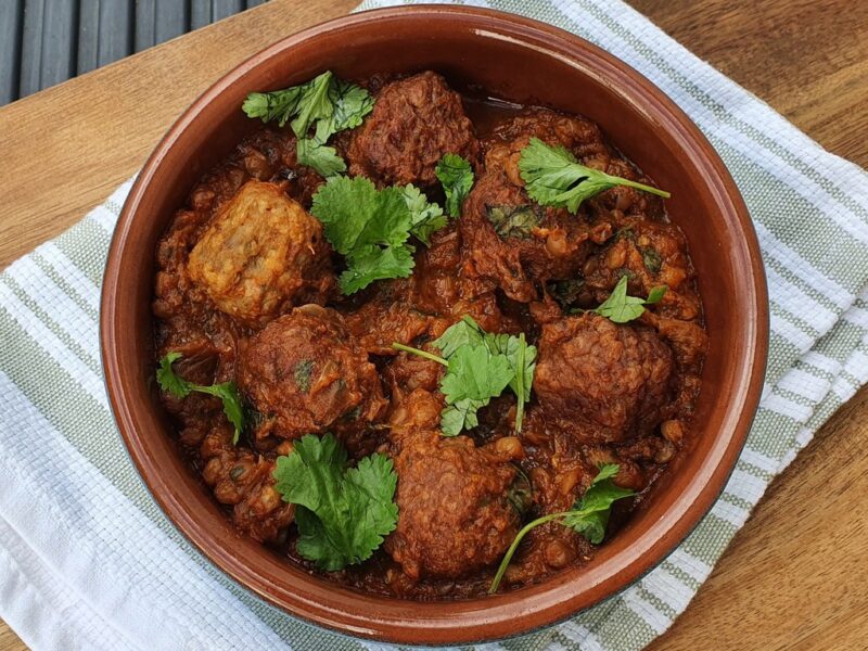 Vegan meatballs in spiced lentil sauce