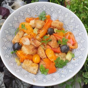 Baked peppers and tomatoes with garlic croutons