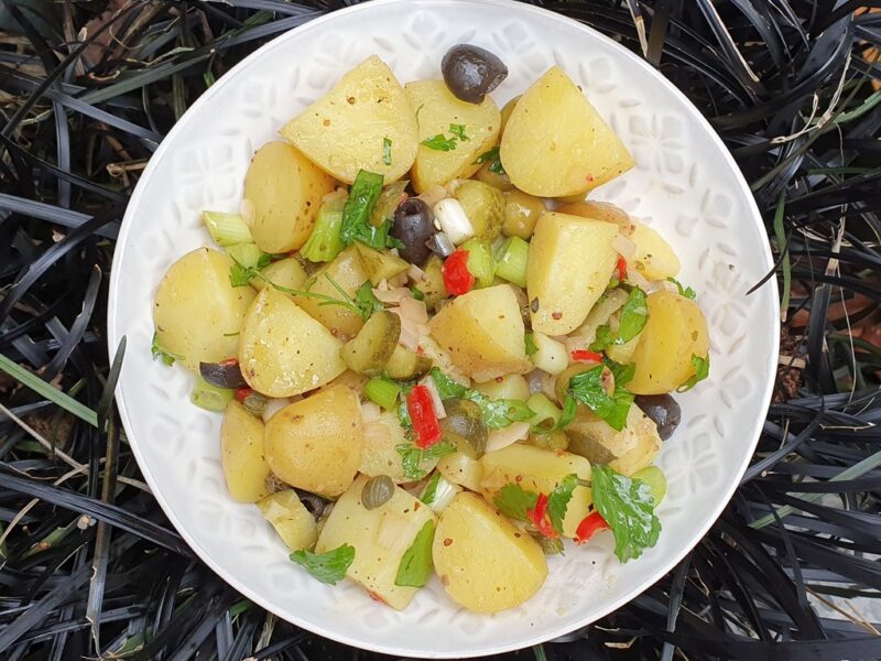 Potato salad with olives and gherkins