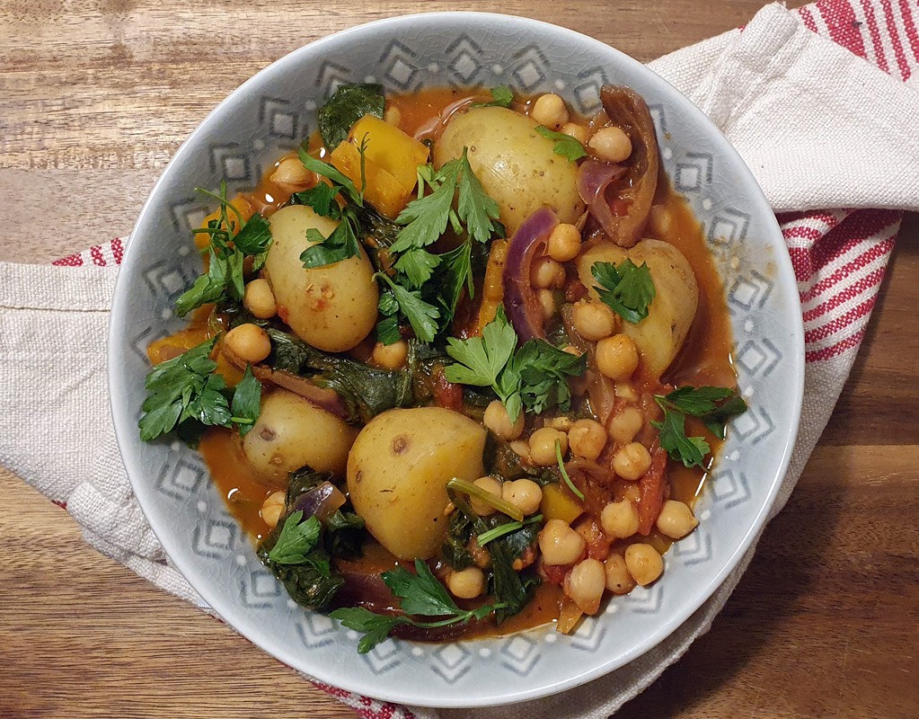 Spiced potato stew with spinach and chickpeas