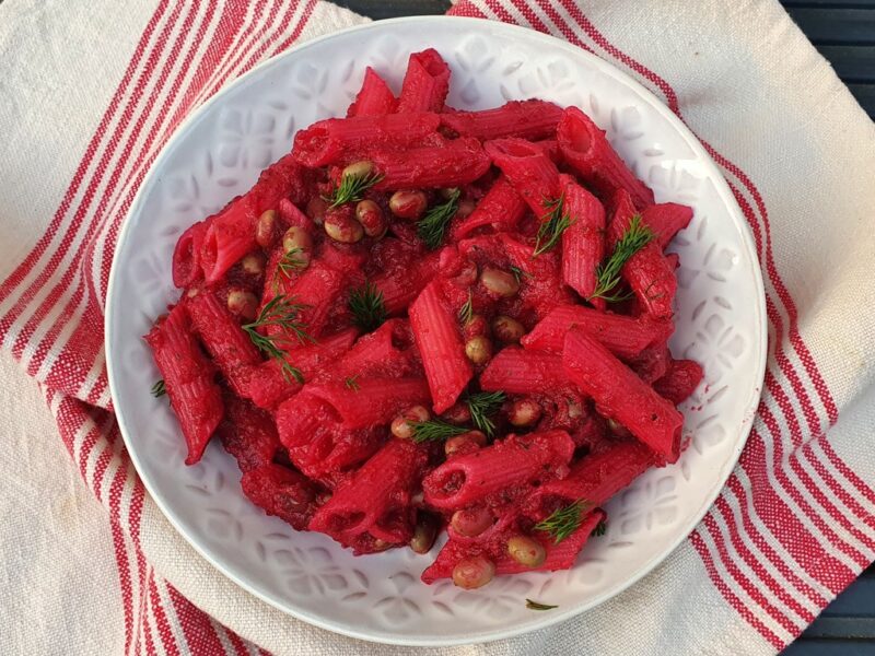 Pasta with beans in dill beetroot sauce