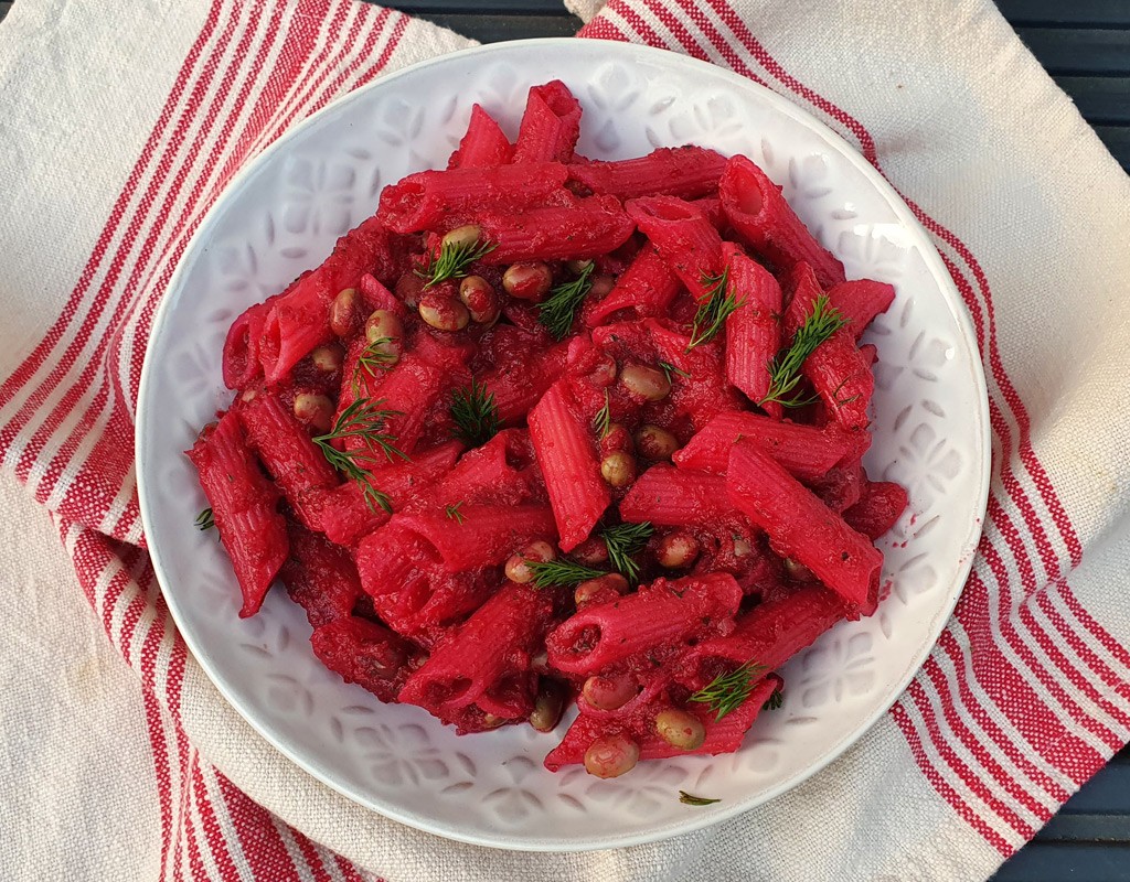 Pasta with beans in dill beetroot sauce