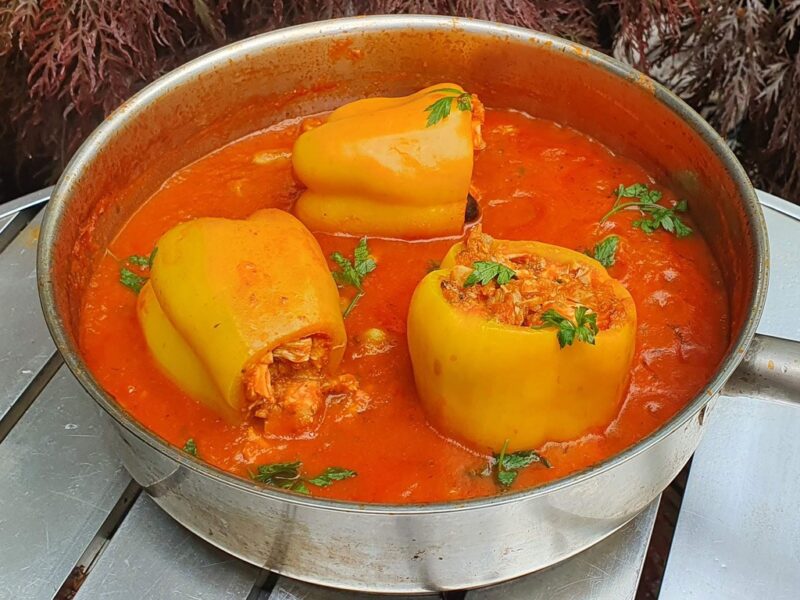 Chicken stuffed peppers in tomato sauce