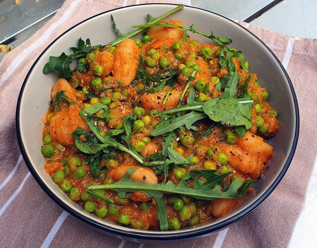 Gnocchi & peas in spiced sweet potato sauce