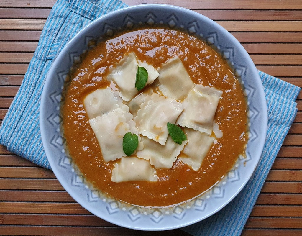 Vegan ravioli in spiced sweet potato sauce