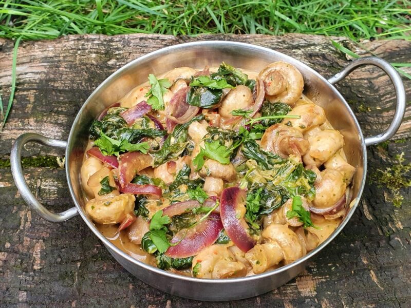 Mushroom and spinach in coconut and peanut sauce