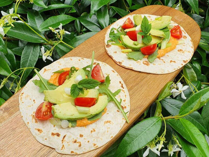 Avocado and roasted pepper hummus tacos