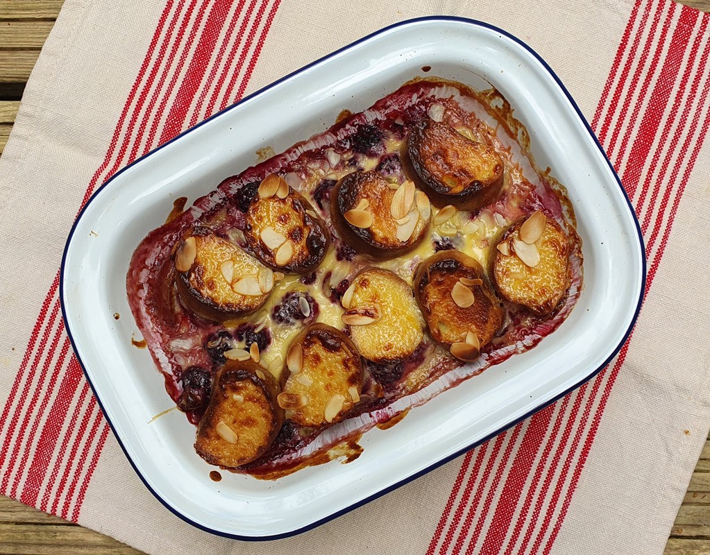 Berry and brioche pudding