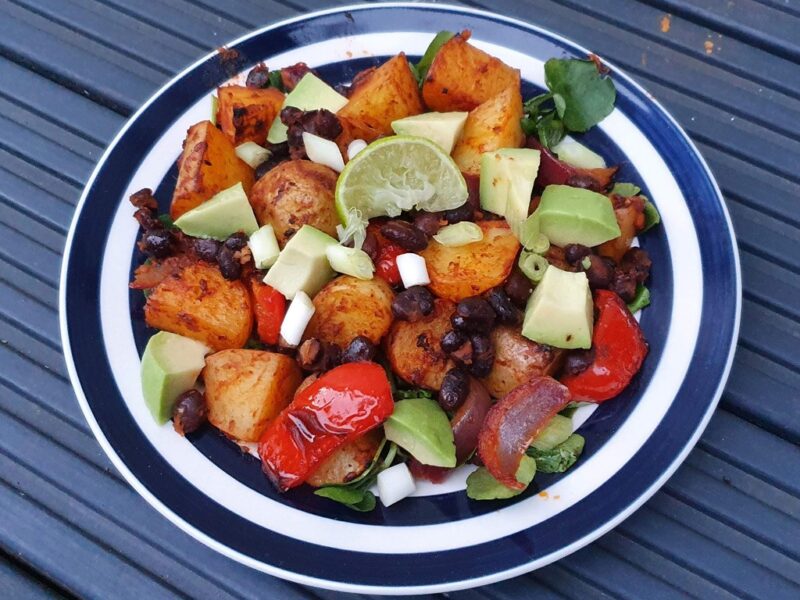 Mexican-style potato and black beans traybake