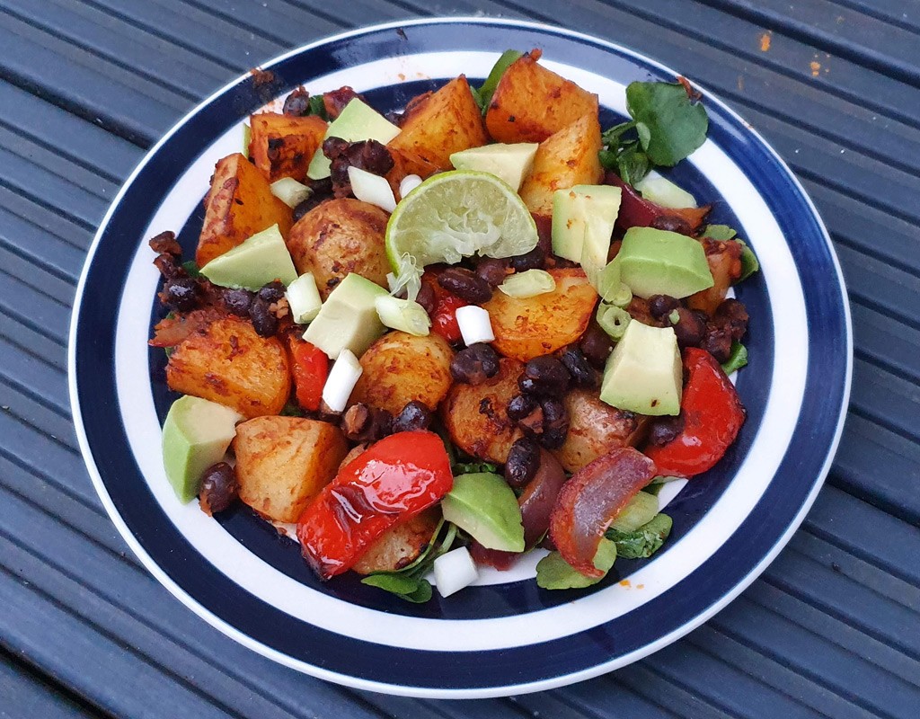 Mexican-style potato and black beans traybake