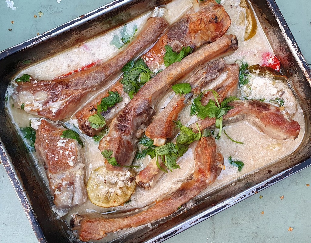 Pork ribs baked in in spiced coconut milk