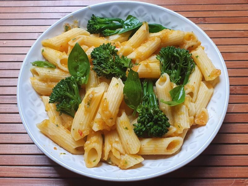 Pasta with broccoli in roasted pepper, sweet potato and chickpea sauce