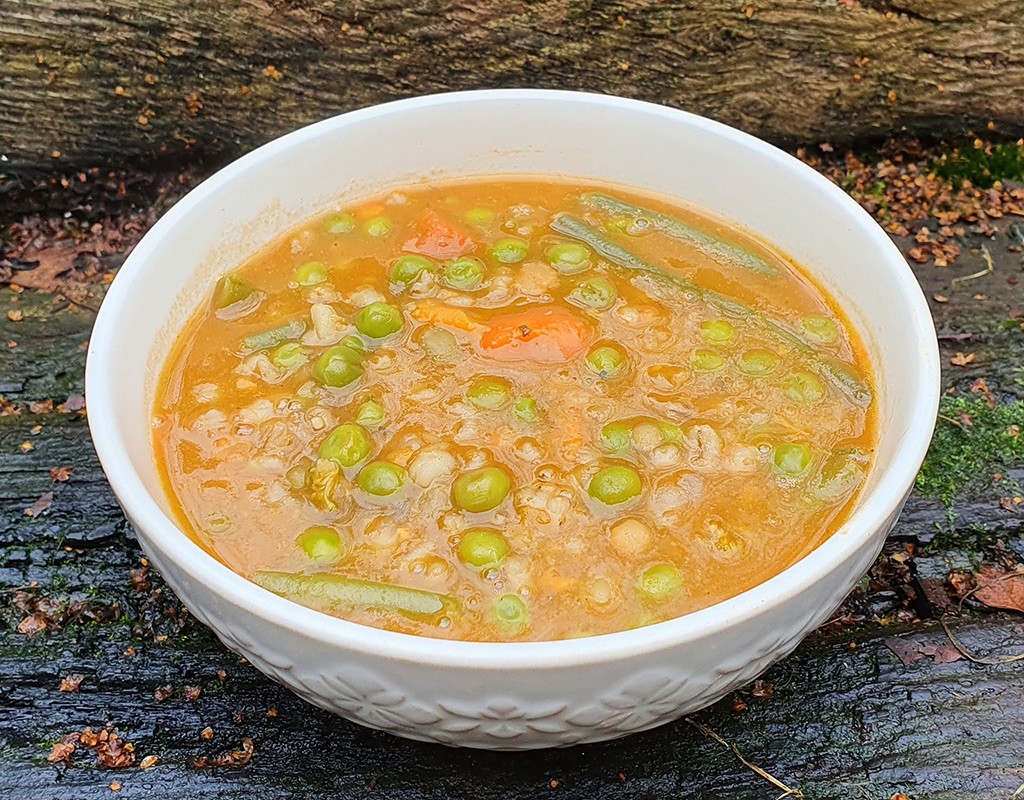 Spiced winter broth with beans and peas