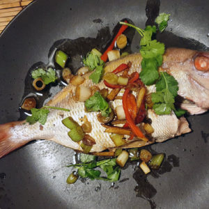 Chinese sizzling steamed fish