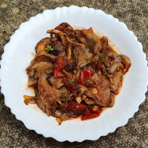 Pan-fried exotic mushrooms with tomatoes