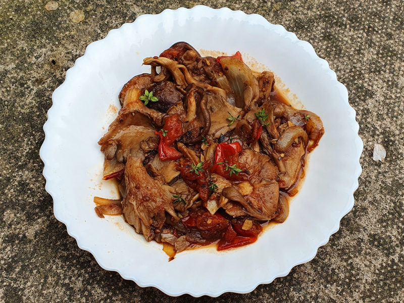 Pan-fried exotic mushrooms with tomatoes