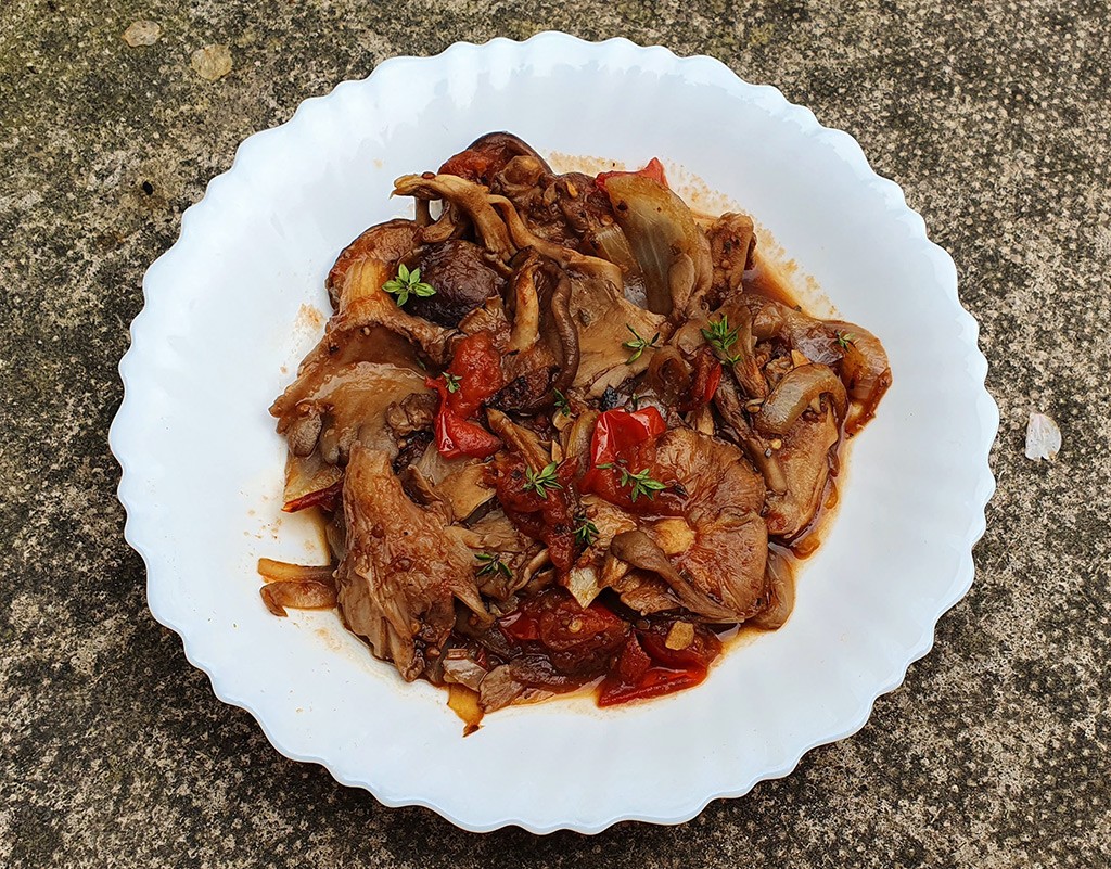 Pan-fried exotic mushrooms with tomatoes