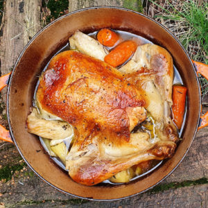 Pot-roasted chicken with lemon and root vegetables