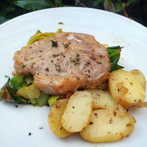 Mustard and garlic pork fillet with potatoes and cabbage