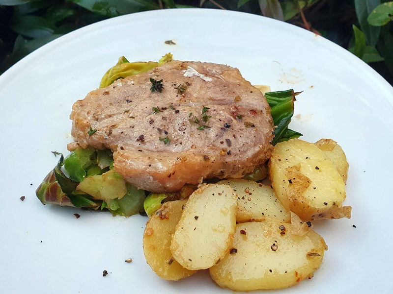 Mustard and garlic pork fillet with potatoes and cabbage