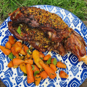 Roast lamb with pistachio, lemon and mint