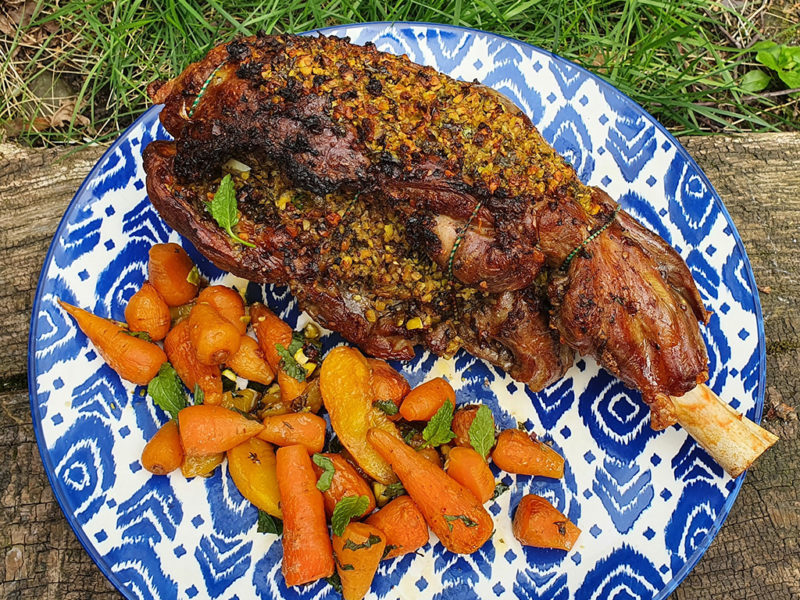 Roast lamb with pistachio, lemon and mint