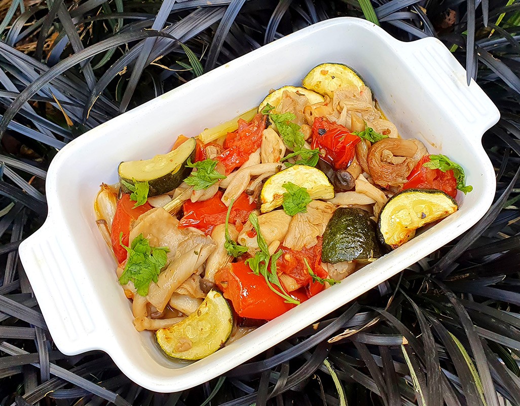 Exotic mushroom, tomato and courgette bake