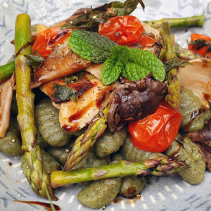 Gnocchi with balsamic mushrooms, tomatoes and asparagus