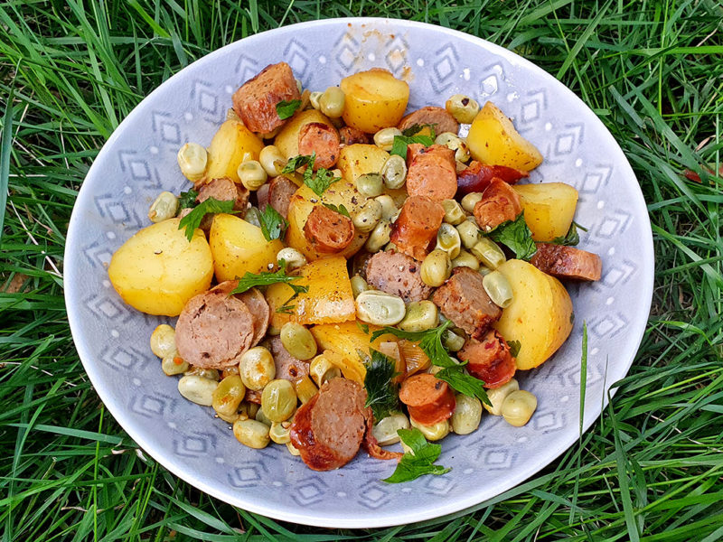 New potatoes with sausages and broad beans