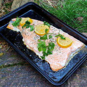 Baked side salmon with lemon and herbs