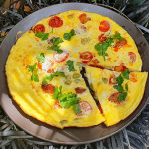 Chorizo, tomato and broad beans omelette