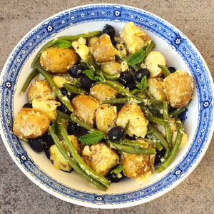 Potato salad with green beans and olives