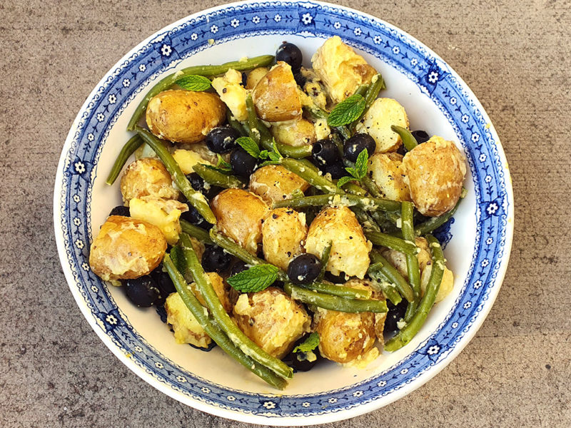 Potato salad with green beans and olives