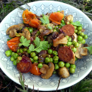 Sauteed mushrooms and peas with chorizo