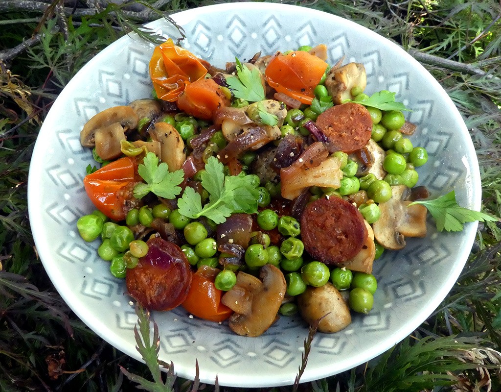 Sauteed mushrooms and peas with chorizo