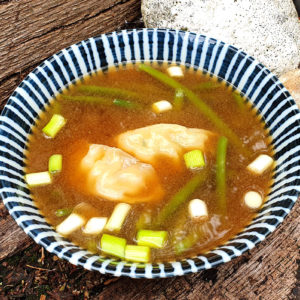 Miso soup with green beans and prawn gyoza