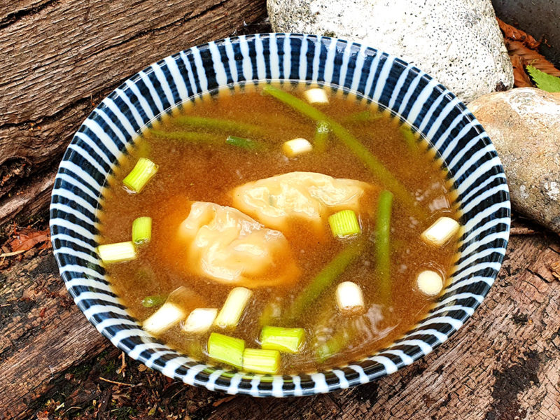 Miso soup with green beans and prawn gyoza