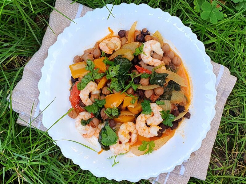 Spiced chickpeas with spinach and prawns