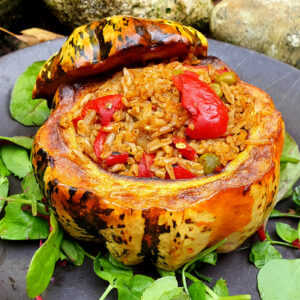 Squash stuffed with vegetable curry and rice