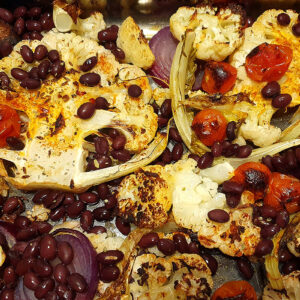 Baked cauliflower steaks with beans