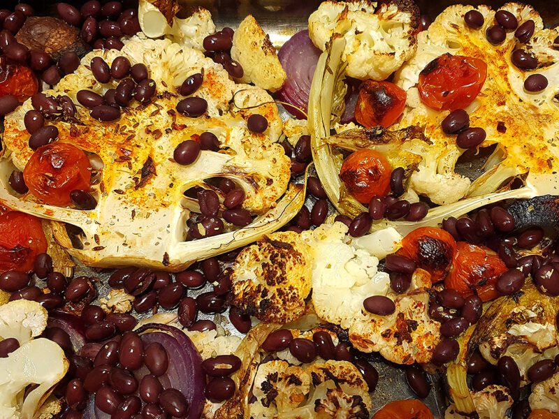 Baked cauliflower steaks with beans