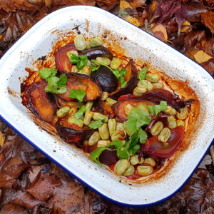 Tomato roasted baby aubergine with broad beans