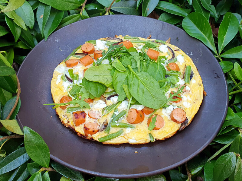 Feta omelette with green beans and frankfurters