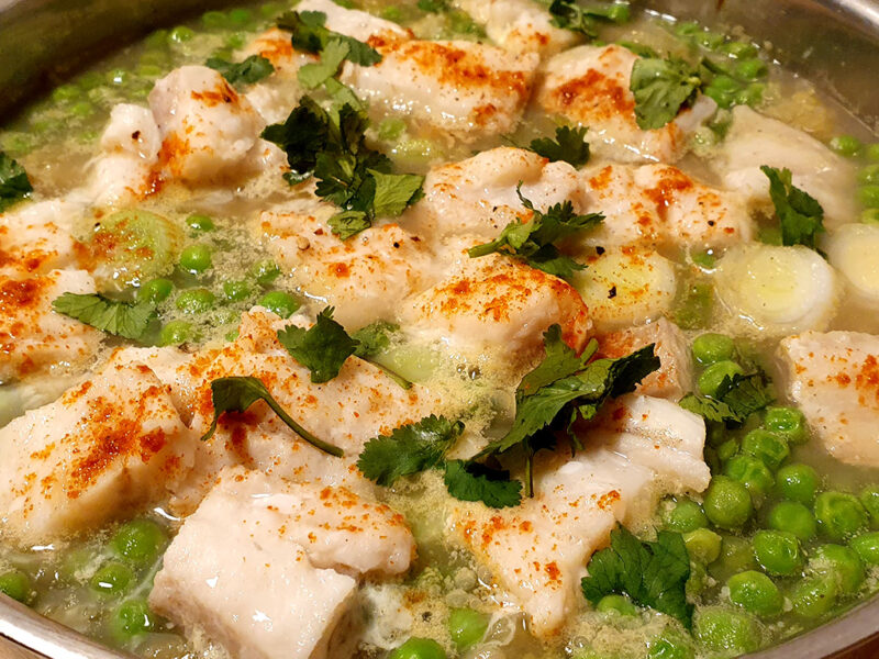 Potato and cod stew with green peas