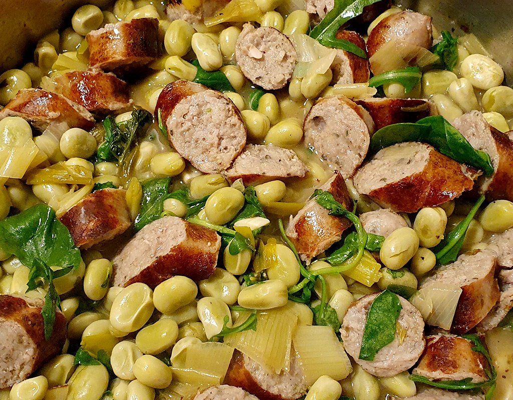 Sausage and broad beans pot