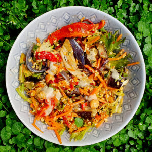 Couscous and vegetable salad with tahini sauce