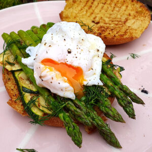 Grilled asparagus and courgette with poached egg