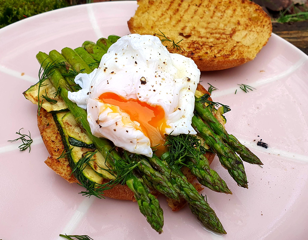 Grilled asparagus and courgette with poached egg